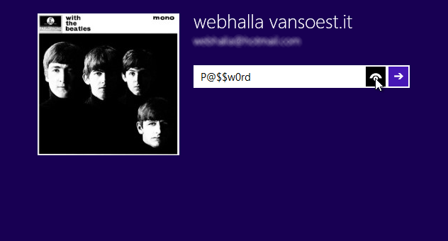 Het Windows 8.1 login scherm met het wachtwoord onthullend oog icoon.